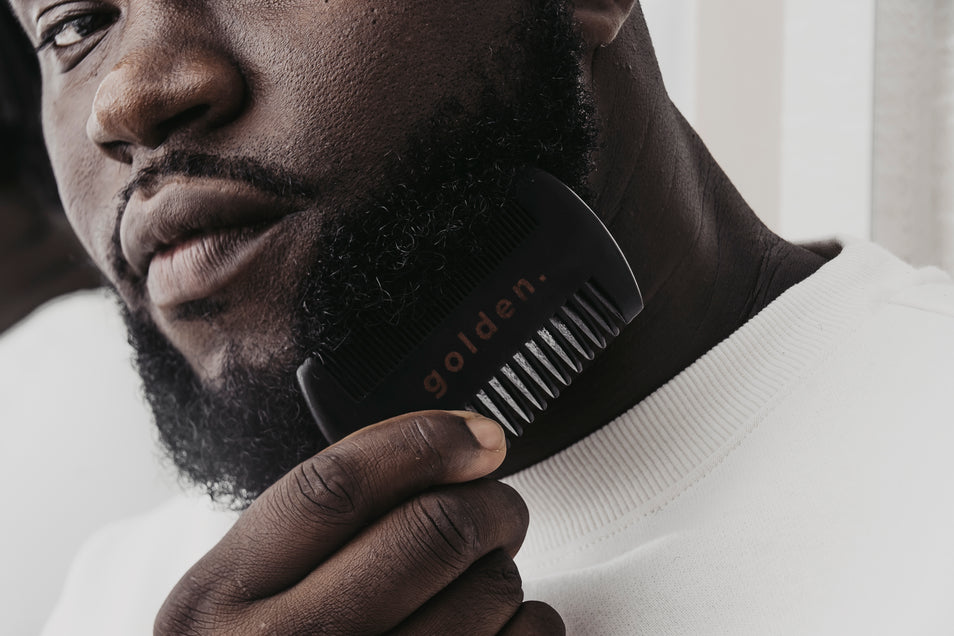 black man smiling because of his great beard